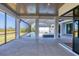 Covered patio overlooking the pool and yard, providing the ideal outdoor entertaining space at 1613 4Th E St, Palmetto, FL 34221