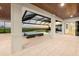 Outdoor space featuring a beautiful pool and hot tub, perfect for relaxation and waterfront enjoyment at 1613 4Th E St, Palmetto, FL 34221