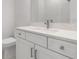 Bathroom showcasing neutral paint, white cabinets and sink at 1617 Sea Haven Dr # 501, Punta Gorda, FL 33950