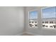 Bedroom showcasing bright windows offering community views and letting in natural light at 1617 Sea Haven Dr # 501, Punta Gorda, FL 33950