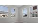 Bright bedroom showcasing several windows offering community views and lots of light at 1617 Sea Haven Dr # 501, Punta Gorda, FL 33950