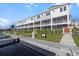 Townhome community featuring well-maintained landscaping, private entrances, and access to canal waterfront at 1617 Sea Haven Dr # 501, Punta Gorda, FL 33950