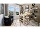 Bright home office featuring a stylish desk, comfortable chair, and ample storage space at 1617 Sea Haven Dr # 501, Punta Gorda, FL 33950