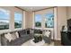 Comfortable living room with large windows, a neutral color scheme, and inviting seating at 1617 Sea Haven Dr # 501, Punta Gorda, FL 33950