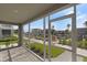 Screened-in patio boasts beautiful views of the lush landscaping and serene canal, perfect for relaxing outdoors at 1617 Sea Haven Dr # 501, Punta Gorda, FL 33950