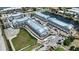 Aerial view of a coastal community with modern buildings and waterfront access under construction at 1617 Sea Haven Dr # 502, Punta Gorda, FL 33950