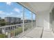 Balcony overlooking a scenic waterfront view with a seating area, ideal for relaxation at 1617 Sea Haven Dr # 502, Punta Gorda, FL 33950