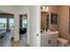 Bathroom features a gray vanity and elegant design at 1617 Sea Haven Dr # 502, Punta Gorda, FL 33950