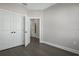 Bedroom with hard wood floors, trim and large double door closet at 1617 Sea Haven Dr # 502, Punta Gorda, FL 33950