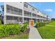 Coastal condos offer screened-in patios, walkways and landscaped grounds for relaxed living at 1617 Sea Haven Dr # 502, Punta Gorda, FL 33950