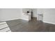 Open concept living room and kitchen space with hardwood floors and neutral colors is bright and modern at 1617 Sea Haven Dr # 502, Punta Gorda, FL 33950