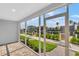 Relax on the patio with views of the waterway and lush landscaping through screened windows at 1617 Sea Haven Dr # 502, Punta Gorda, FL 33950