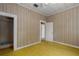 Bedroom featuring a closet, doorway, and view of another bedroom at 1704 4Th W St, Palmetto, FL 34221