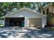 Spacious detached garage with room for storage and projects at 1704 4Th W St, Palmetto, FL 34221