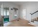 Bright room featuring carpet and views to the enclosed porch at 1704 4Th W St, Palmetto, FL 34221