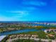 Stunning aerial view of coastal community with beautiful waterfront and scenic skyline at 1712 Starling Dr # 101, Sarasota, FL 34231
