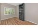 Bright area featuring a built-in bookcase next to a window at 1712 Starling Dr # 101, Sarasota, FL 34231