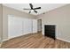 Bedroom featuring a closet, ceiling fan, and wood-look tile at 1712 Starling Dr # 101, Sarasota, FL 34231