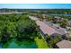 Beautiful exterior view of the apartments with a private lake and well-maintained landscaping in a serene community at 1712 Starling Dr # 101, Sarasota, FL 34231