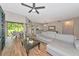Inviting living area featuring stylish furnishings, wood-look tile, and lots of natural light at 1712 Starling Dr # 101, Sarasota, FL 34231