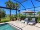 Beautiful pool and patio area, perfect for outdoor relaxation and entertainment at 17820 Waterville Pl, Lakewood Ranch, FL 34202