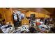 Well-lit kitchen with wood cabinets, black appliances, and ample counter space, ready for culinary creations at 1810 Rudder Dr, Valrico, FL 33594