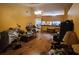 Spacious living room featuring an open layout with wood floors, offering potential for entertaining at 1810 Rudder Dr, Valrico, FL 33594
