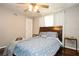 Bedroom featuring hardwood floors, ceiling fan, and side tables at 1813 5Th W St, Palmetto, FL 34221