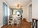 Dining room showcasing the ceiling fan, table with chairs, and view to living space at 1813 5Th W St, Palmetto, FL 34221