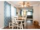 Dining room view with a table, chairs, and view to the living room and front door at 1813 5Th W St, Palmetto, FL 34221