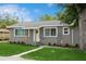 Inviting single-story home with well-maintained lawn and landscaped garden beds at 1813 5Th W St, Palmetto, FL 34221