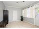 This living room features tile flooring, lots of storage, and a plant for added flair at 1813 5Th W St, Palmetto, FL 34221