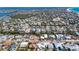Island neighborhood with lush trees near street offers beautiful scenery in residential area at 216 Archer Way, Anna Maria, FL 34216