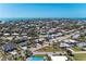Island home with lush trees near street offers beautiful scenery in residential area at 216 Archer Way, Anna Maria, FL 34216