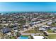 Island home with lush trees near street offers beautiful scenery in residential area at 216 Archer Way, Anna Maria, FL 34216