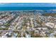 Island neighborhood with lush trees, beach and residential homes offers beautiful scenery at 216 Archer Way, Anna Maria, FL 34216