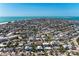 Island neighborhood with lush trees and residential homes near the shore, offering beautiful scenery at 216 Archer Way, Anna Maria, FL 34216