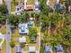 Aerial perspective of the home nestled among trees within the surrounding neighborhood at 2326 2Nd E Ave, Bradenton, FL 34208