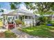 Charming backyard with mature landscaping and porch at 2326 2Nd E Ave, Bradenton, FL 34208