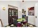 Inviting breakfast nook features a built-in cabinet and decoratively painted plates at 2326 2Nd E Ave, Bradenton, FL 34208