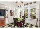 Bright breakfast nook with black and white tiled floor, views to the exterior and cozy ambiance at 2326 2Nd E Ave, Bradenton, FL 34208