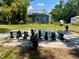 Large backyard chess board on the property with a view of the home at 2326 2Nd E Ave, Bradenton, FL 34208