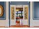 Formal dining room with hardwood floors and decorative chandelier at 2326 2Nd E Ave, Bradenton, FL 34208