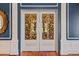 Grand doorway with ornate carvings and decorative molding at 2326 2Nd E Ave, Bradenton, FL 34208