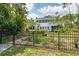 Charming two-story home with lush landscaping and mature trees at 2326 2Nd E Ave, Bradenton, FL 34208