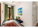 Hallway with green curtains, a plush bench, and an ornate Turkish rug at 2326 2Nd E Ave, Bradenton, FL 34208
