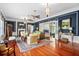 Spacious living room with hardwood floors and decorative molding at 2326 2Nd E Ave, Bradenton, FL 34208