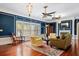 Elegant living room with hardwood floors and abundant natural light at 2326 2Nd E Ave, Bradenton, FL 34208