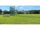 Expansive baseball field and picnic tables, perfect for outdoor recreation and community gatherings at 244 Dove Trl, Bradenton, FL 34212