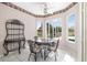 Charming breakfast nook with views of the pool and lanai, perfect for casual dining at 244 Dove Trl, Bradenton, FL 34212